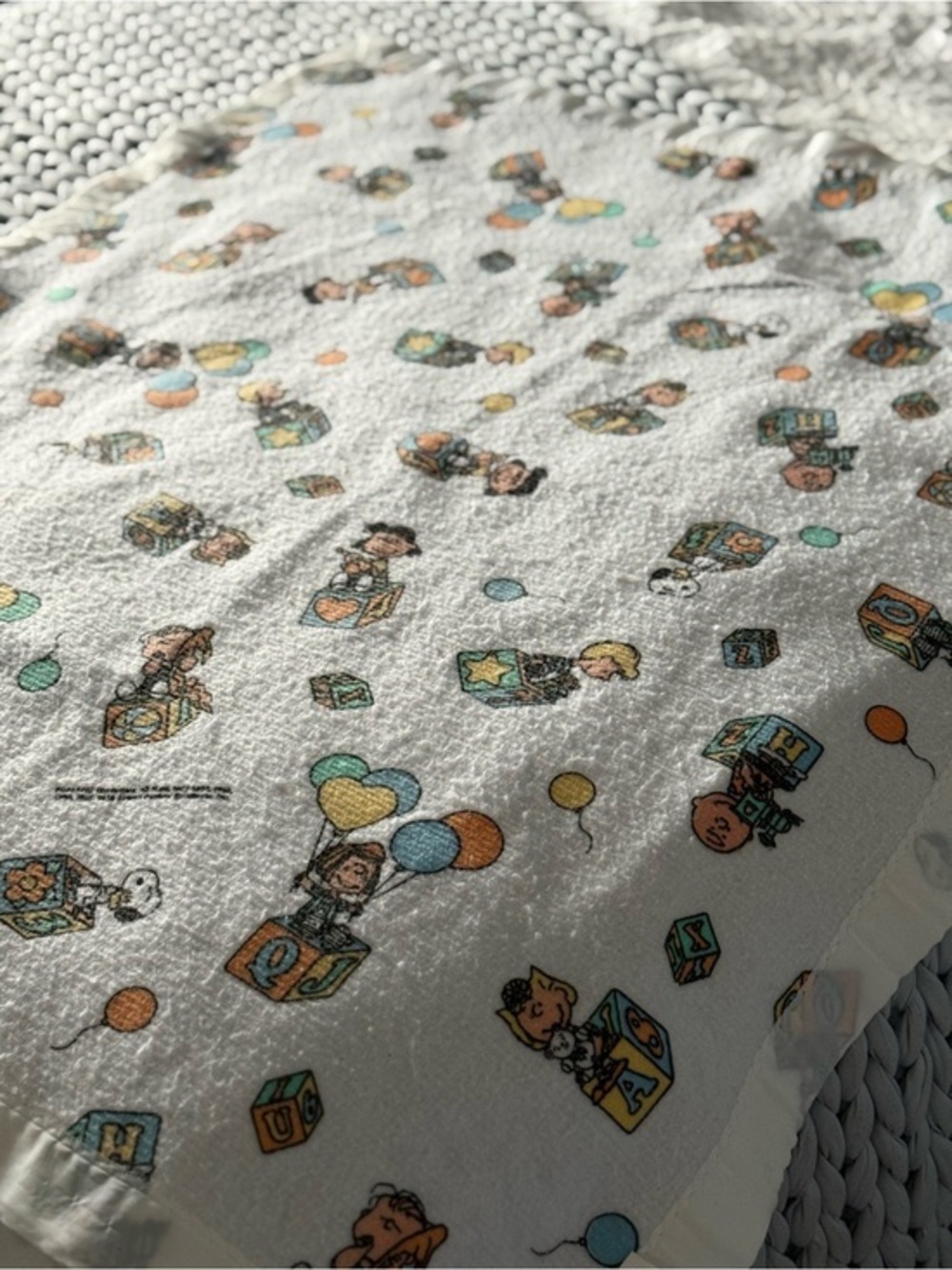 Rare Peanuts fleece with nylon style trim baby blanket made in Canada by Esmond.